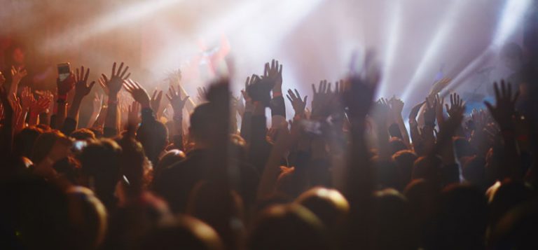 Crowd with hands up at a concert
